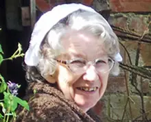 Liz in C&N Garb Home